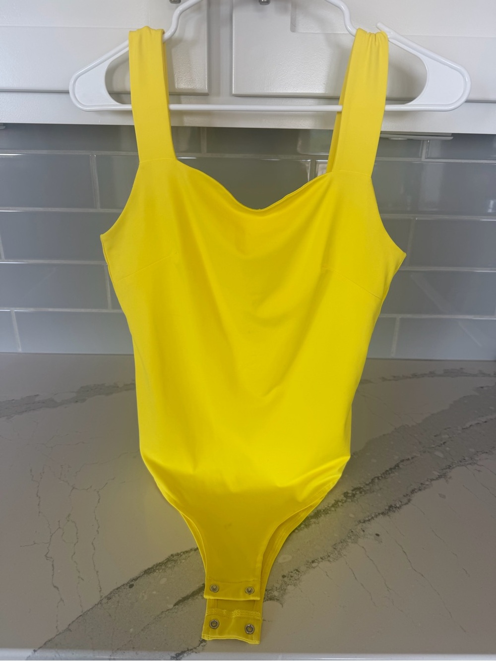 Women’s Yellow One-Piece Bodysuit